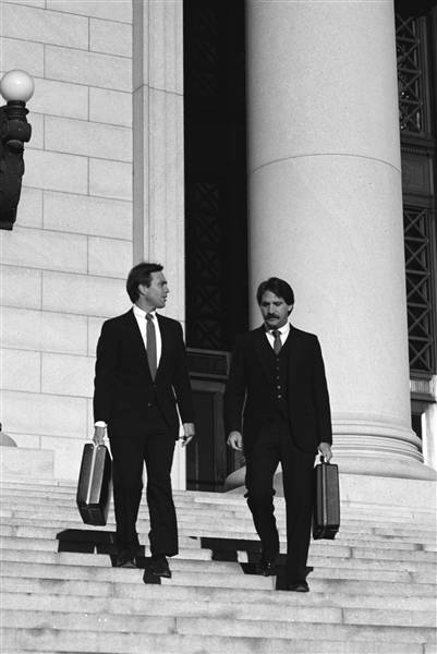 image of two lawyers on court house steps